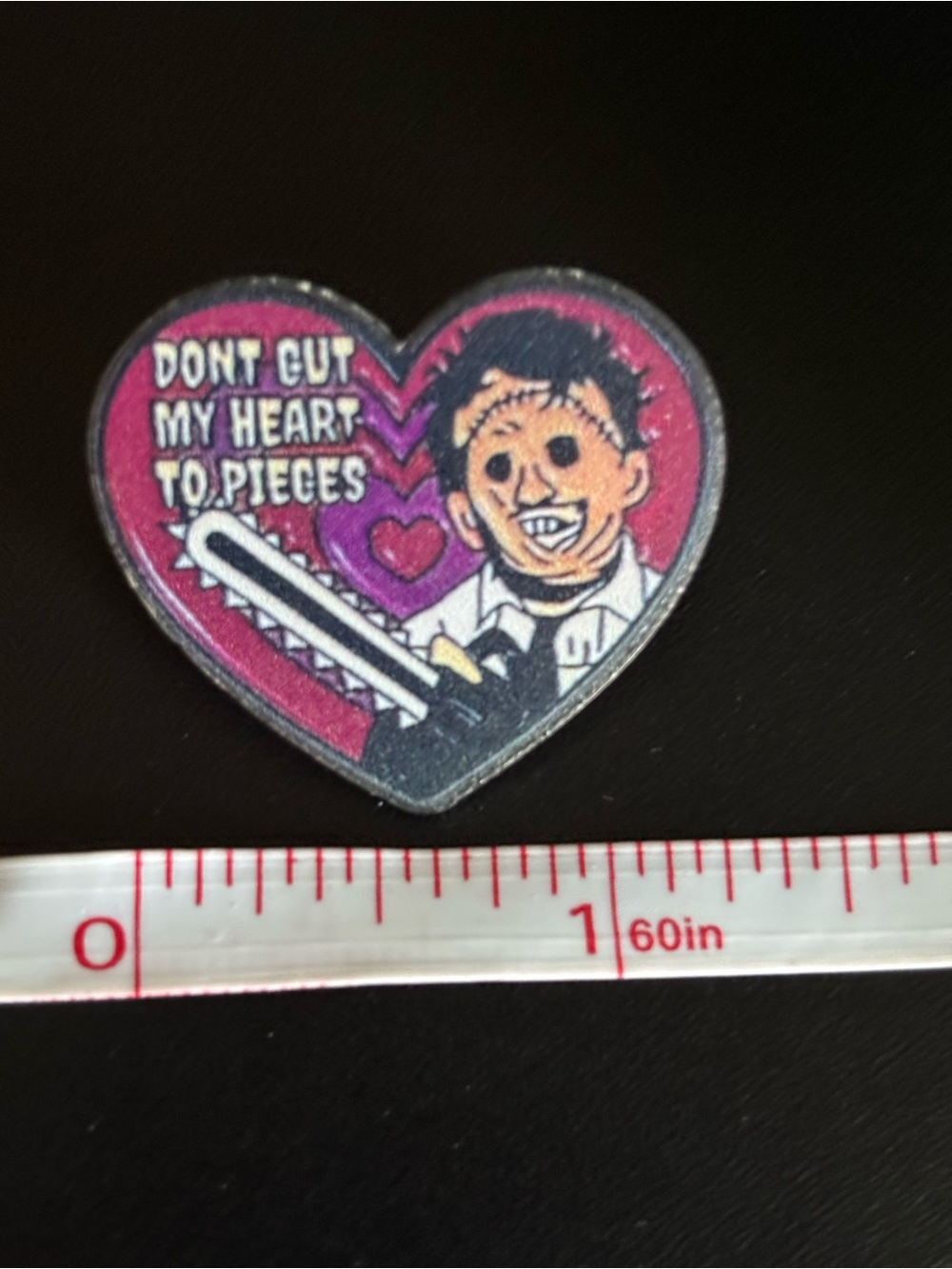Leather Face Heart-Shaped Novelty Pin in Purple and Black